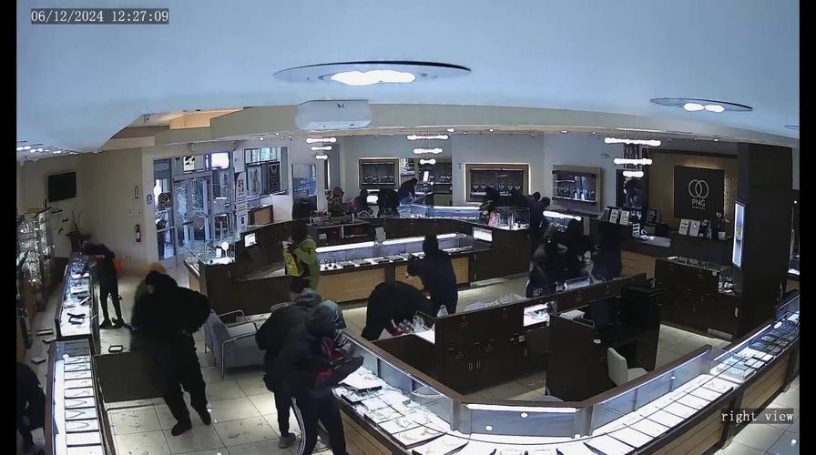 Shocking video shows 20 smash-and-grab bandits overwhelm California jewelry store in wild heist