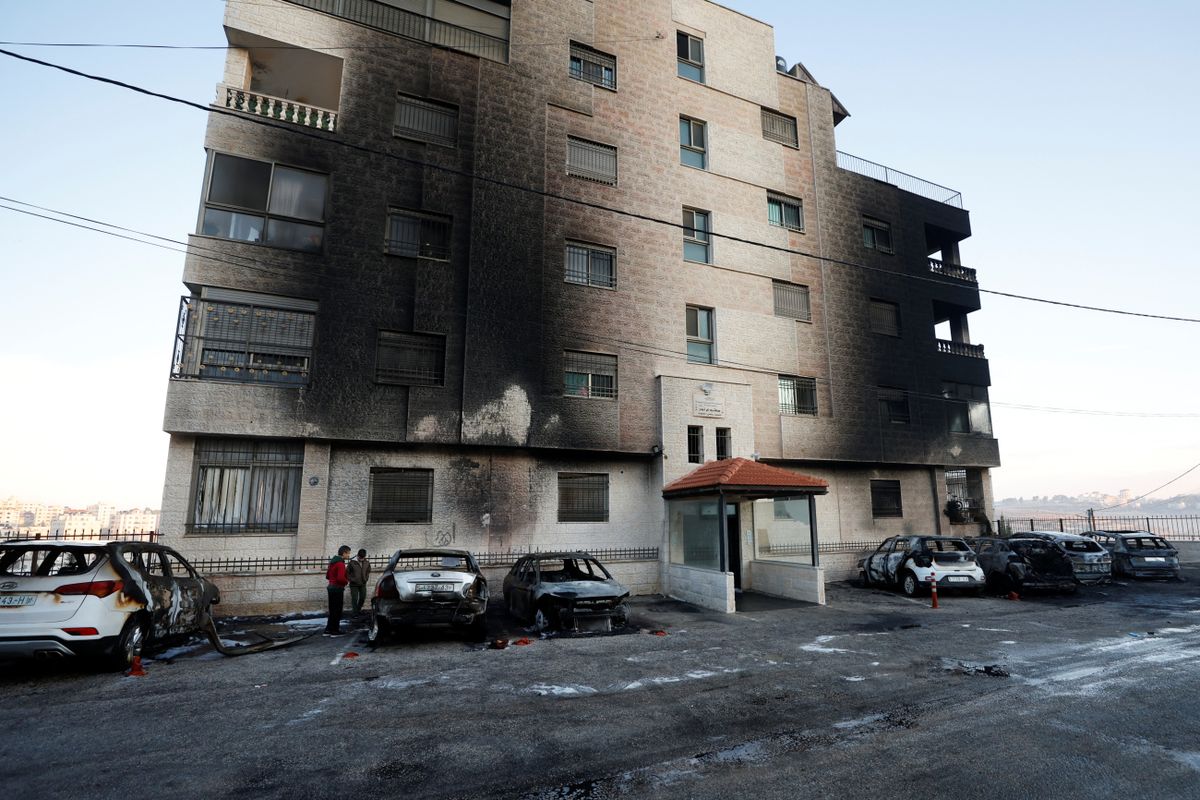 Armed Israeli settlers torch Palestinian homes, cars and olive trees across West Bank