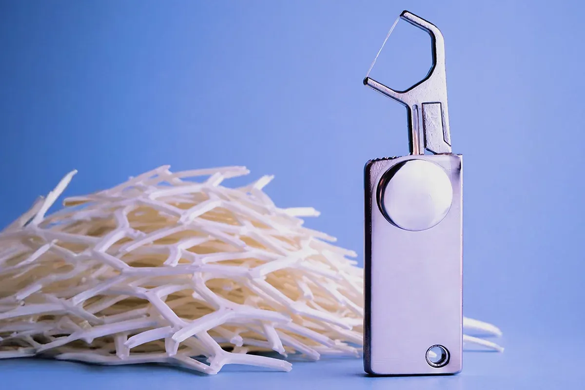 Reusable dental flosser skips disposable plastic for an EDC-style design