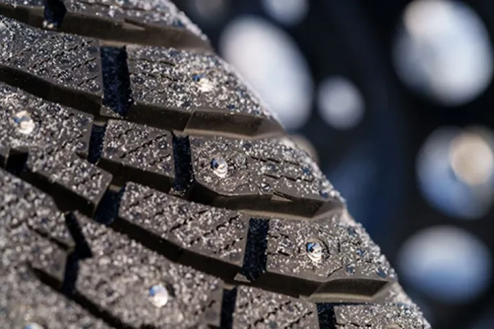 Radical winter tires automatically deploy retractable studs for traction on icy roads