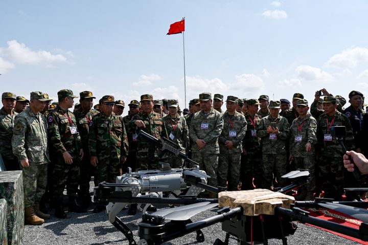 China unveils robot ‘dogs of wars’ with machine guns mounted on their backs