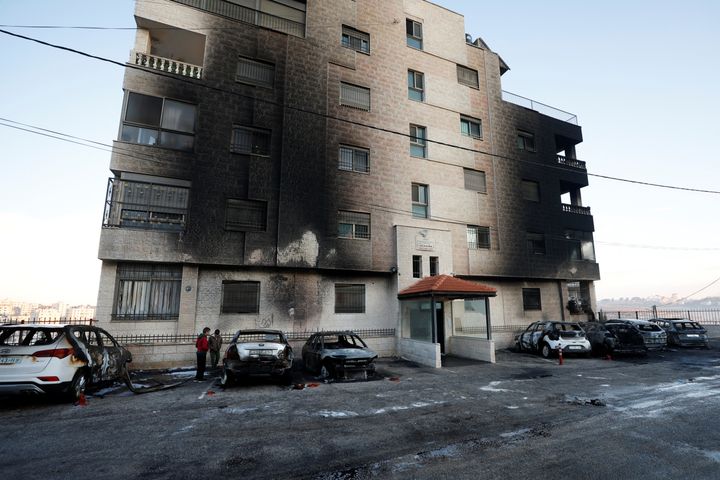 Armed Israeli settlers torch Palestinian homes, cars and olive trees across West Bank