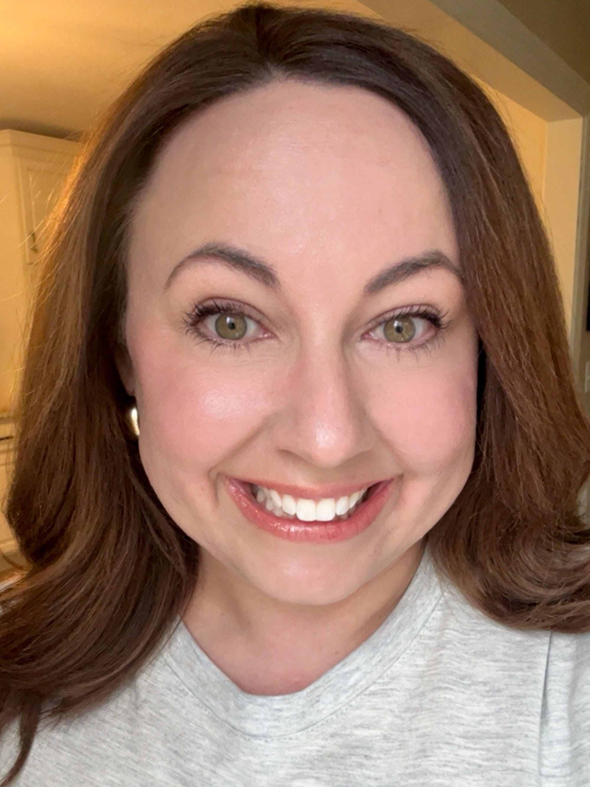 Lisa Eldridge Seamless Skin Enhancing Tint Shade T7 swatch on neutral skin tone.
