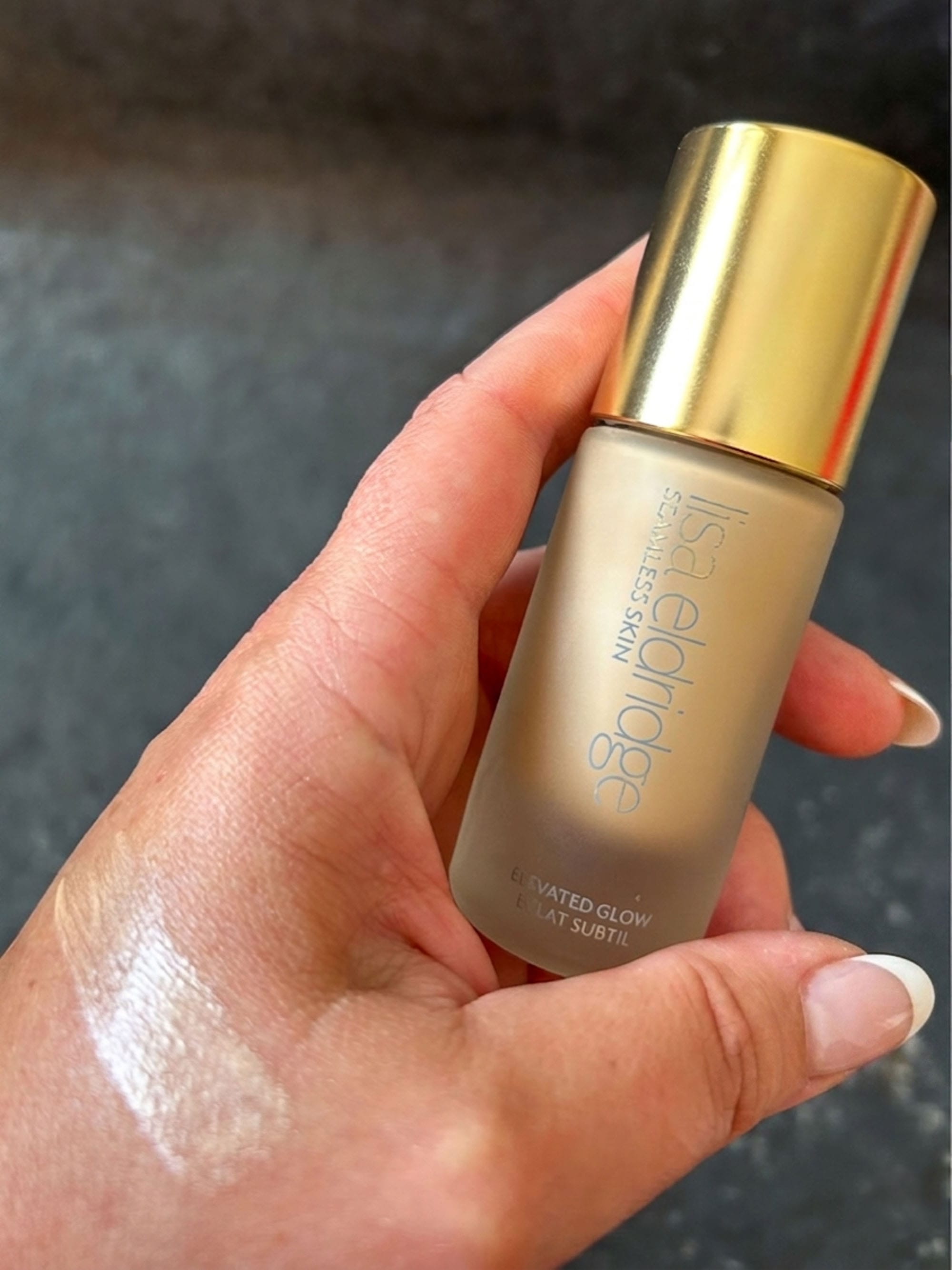 Lisa Eldridge Elevated Glow Highlighter swatch in the shade Crystal Nebula on neutral, fair skin