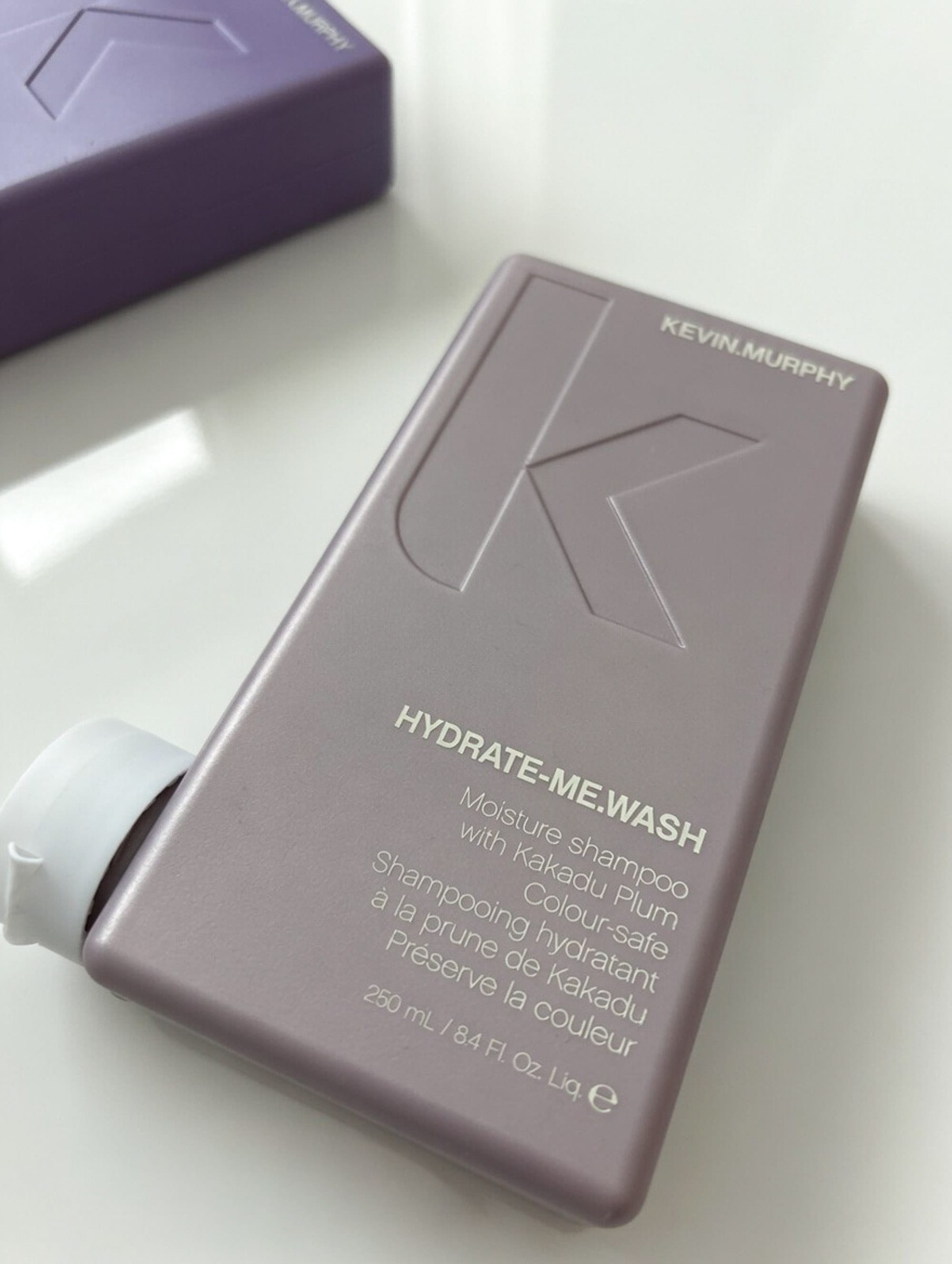 Bottles of Kevin Murphy Hydrate Me Wash and Hydrate Me Rinse