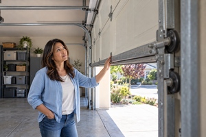 Why Garage Door Tracks And Rollers Need Attention Over Time