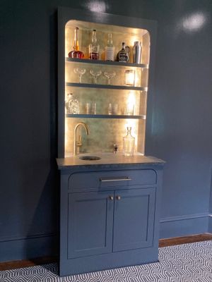 Brass cabinet backsplash