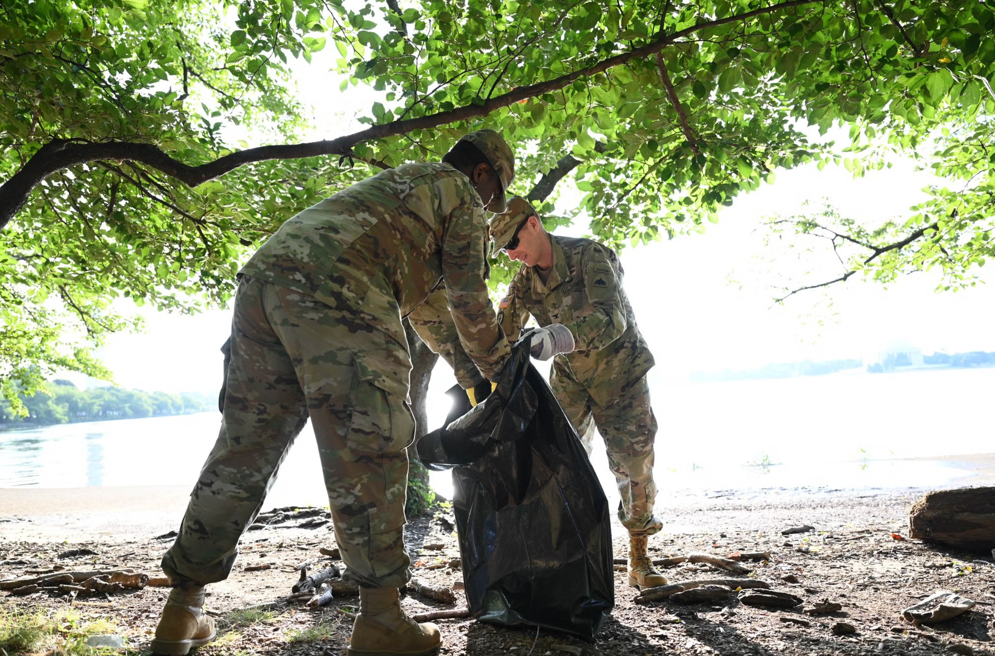 National Guard troops picking up trash