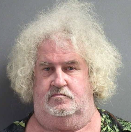 Mugshot of a man who, ok, maybe I suppose one could mistake for Sammy Hagar