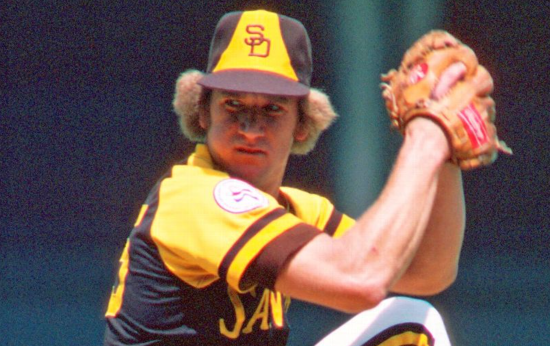 Randy Jones in classic Padres mustard and brown colors, winding up for a pitch