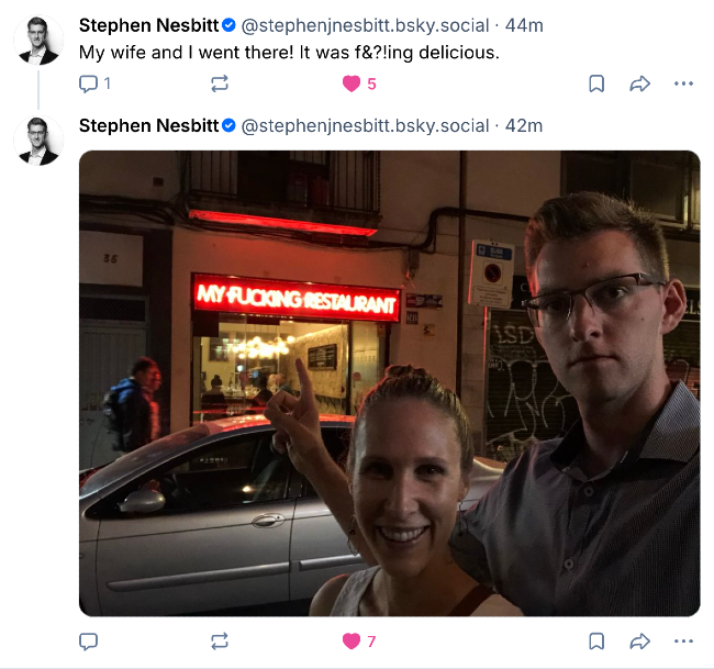 Bluesky post, responding to me, from Stephen Nesbitt of The Athletic with a photo of him and is wife standing in front of "My Fucking Restaurant" in Barcelona