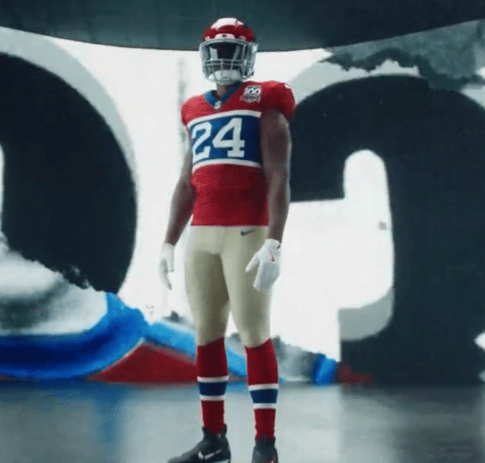 Alternate Giants uniform. Red jersey with wide blue field across it in which the number appeares. Sort of looks like an old sweater
