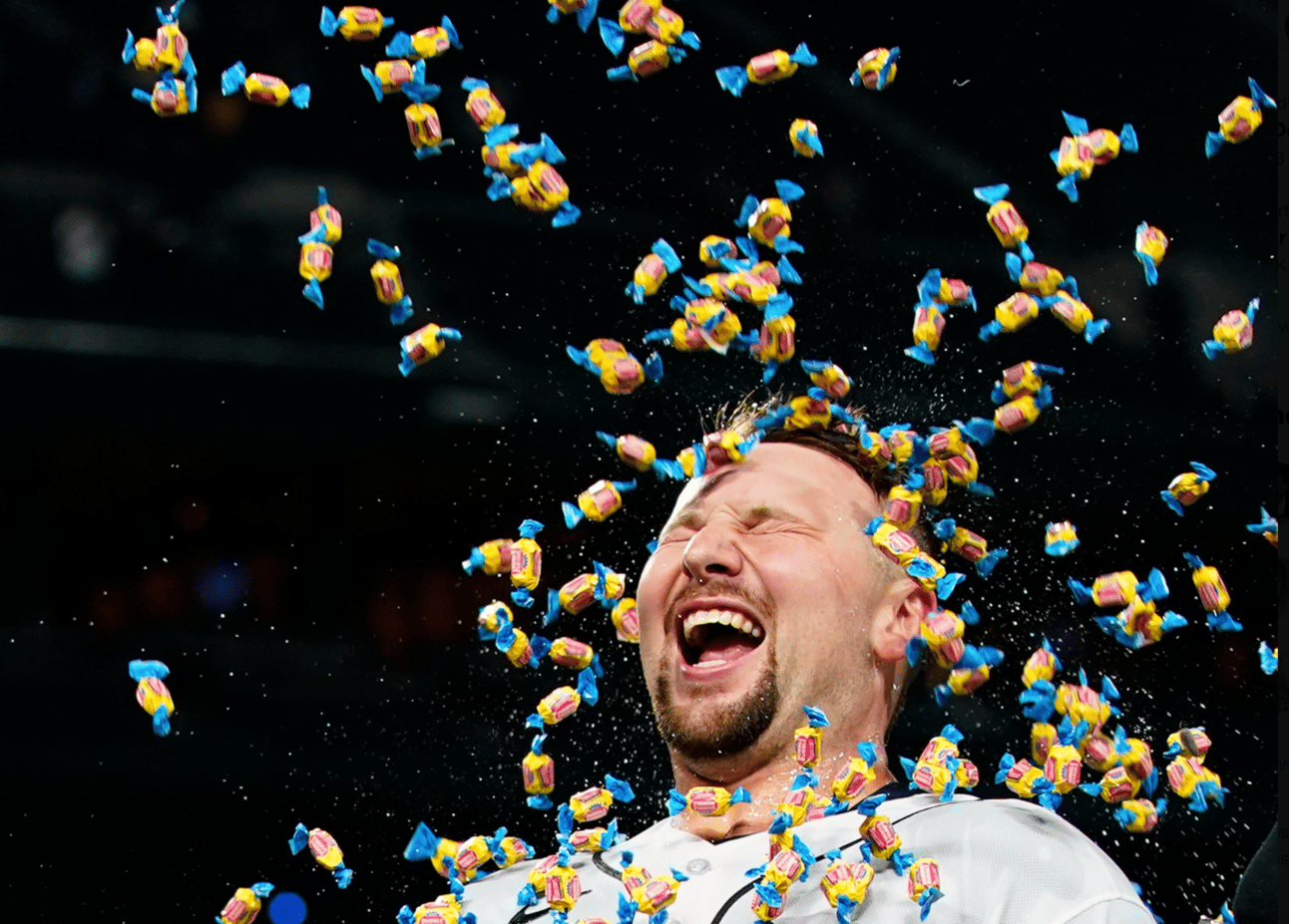 Cal Raleigh having bubblegum thrown at him