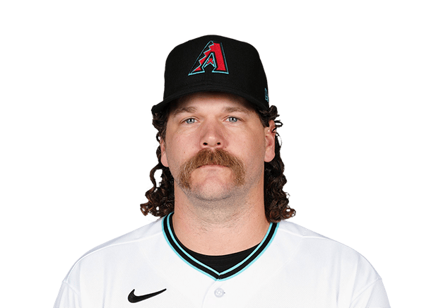 Andrew Chafin, with a long wet, curly mullet and a big walrus mustache