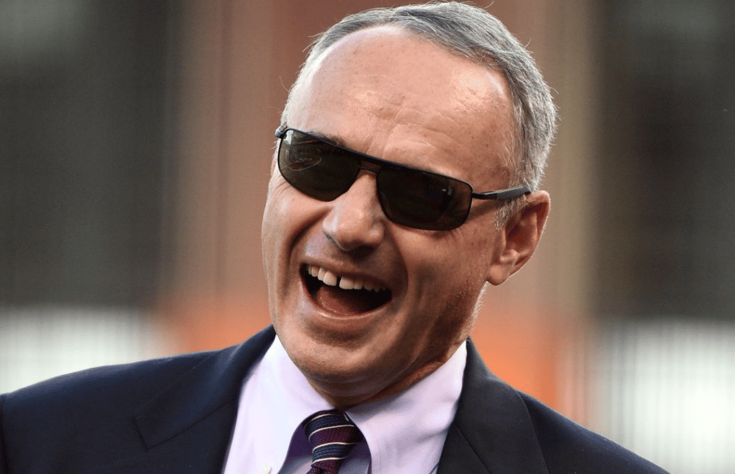 Rob Manfred wearing sunglasses