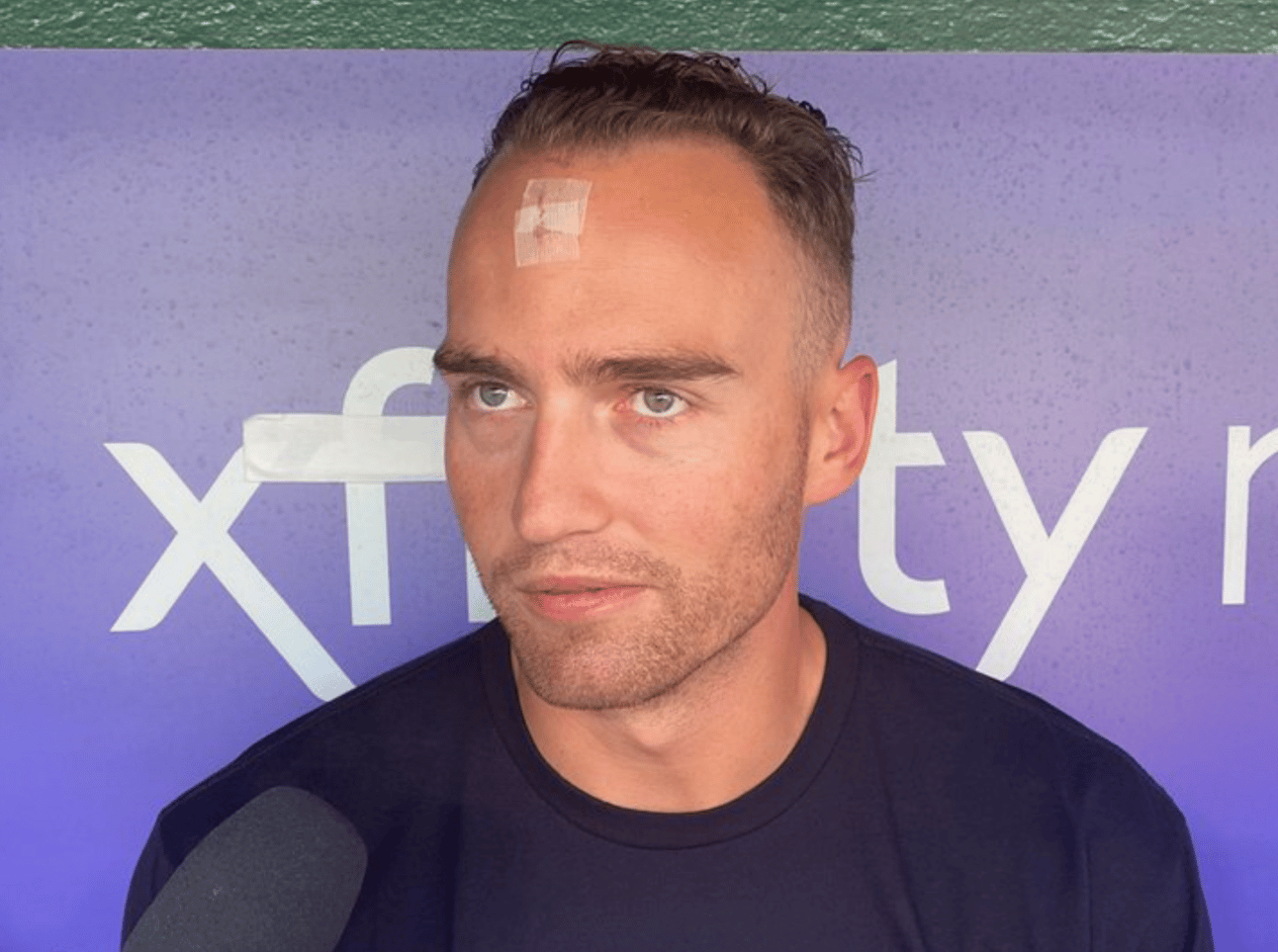 Brandon Nimmo with a cut on his head