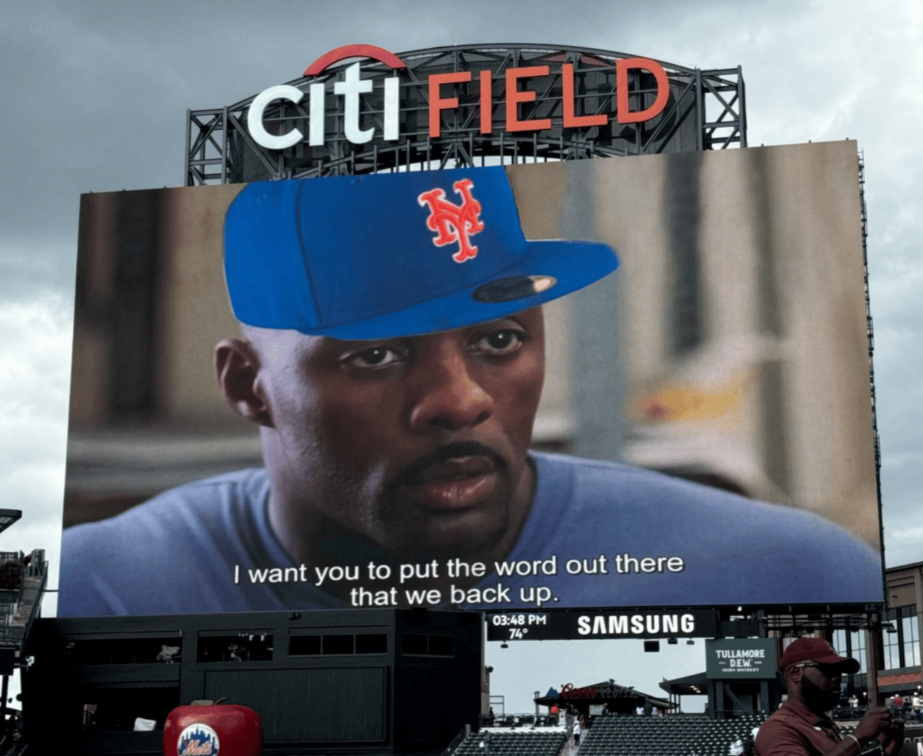 Citi Field scoreboard, with a photo of Stringer Bell from "The Wire" wearing a Mets cap and the caption "I want you to put the word out there that we back up"