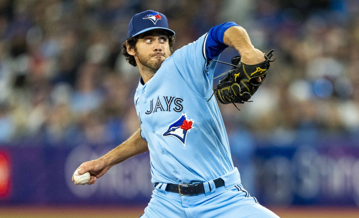 Jordan Romano pitching in a Blue Jays uniform