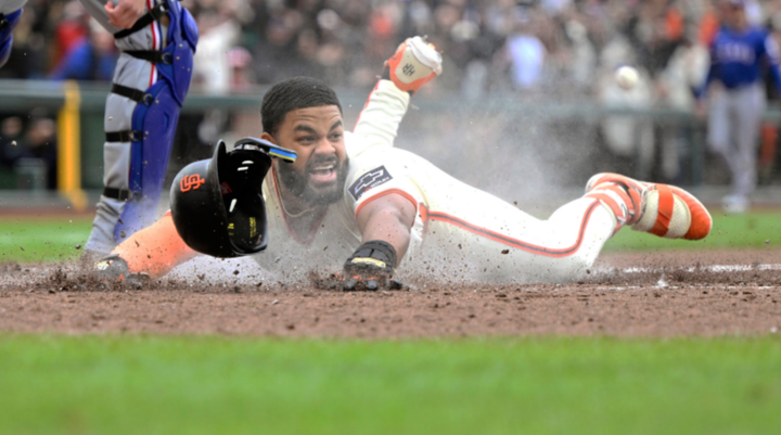 Heloit Ramos sliding into home head first