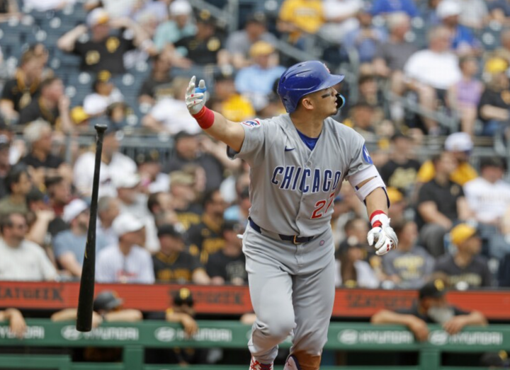 Seiya Suzuki flipping his bat after hitting a home run