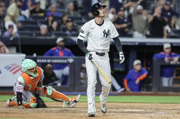 Cody Bellinger admiring a grand slam as he leaves the batter's box