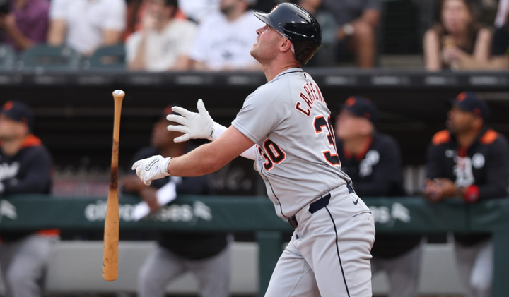 Kerry Carpenter flipping a bat after a home run
