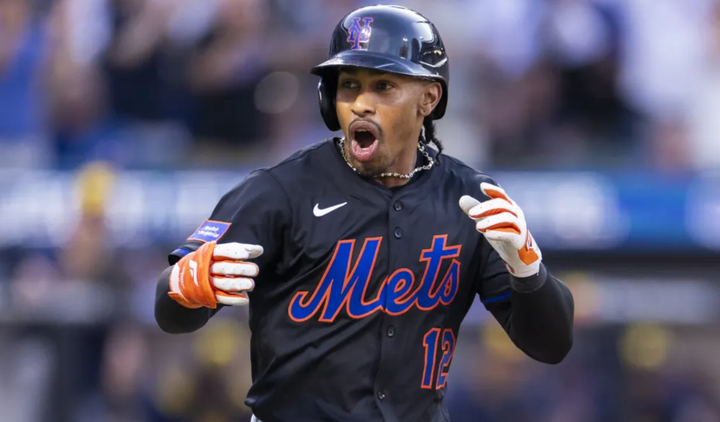 Francisco Lindor reacts after a home run