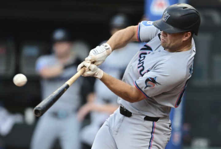 Jakob Marsee making contact with the ball