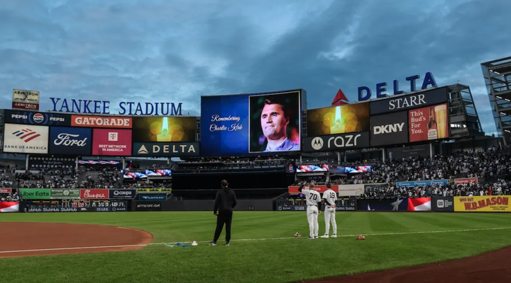 Yankee Stadium scoreboard showing Charlie Kirk during a moment of silence