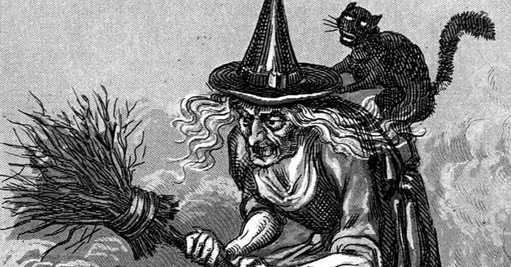 Etching of a witch with a black cat on her shoulder
