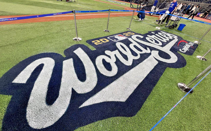 World Series 2025 logo being painted on the field at Rogers Centre
