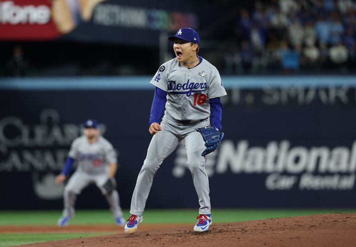 Yoshinubo Yamamoto yelling after recording the final out in his complete game victory on Saturday night