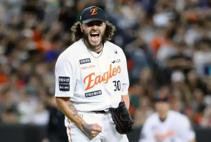 Cody Ponce in a Hawha Eagles jersey, celebrating a strikeout with a first-pump thingy
