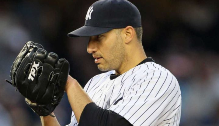Andy Pettitte getting ready to throw a pitch for the Yankees way back in the day
