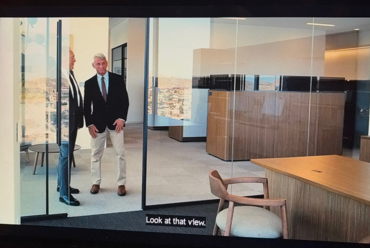 Col. Lockjaw in "One Battle After Another" being shown his new office