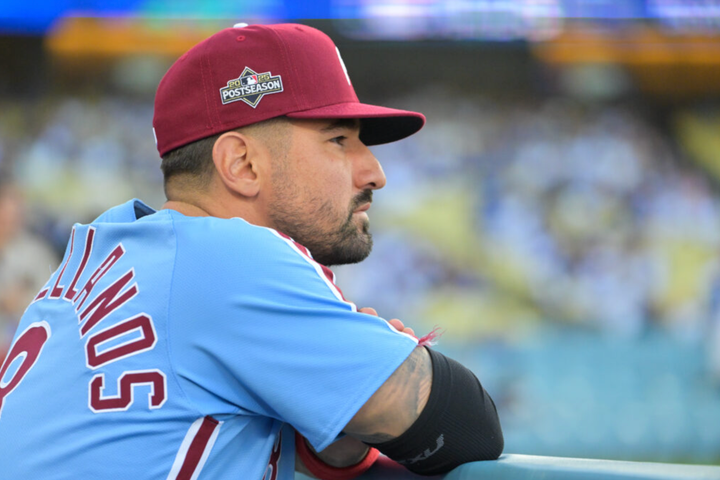 Nick Castellanos in the dugout looking at the field 