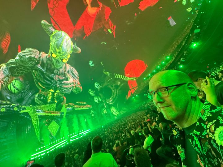 Me at the Sphere. There's a giant demon DJ on the screen above me