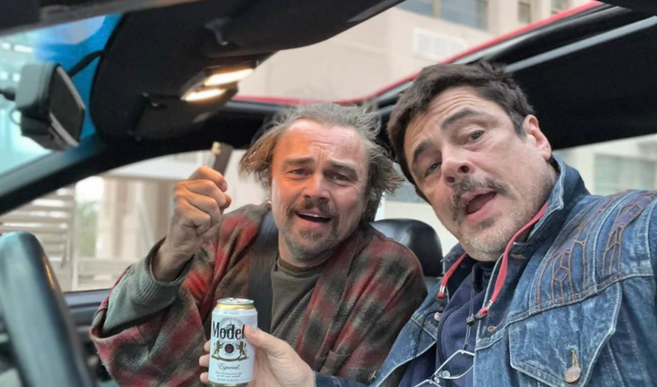Leo DiCaprio and Benicio del Toro with a beer from One Battle After Another