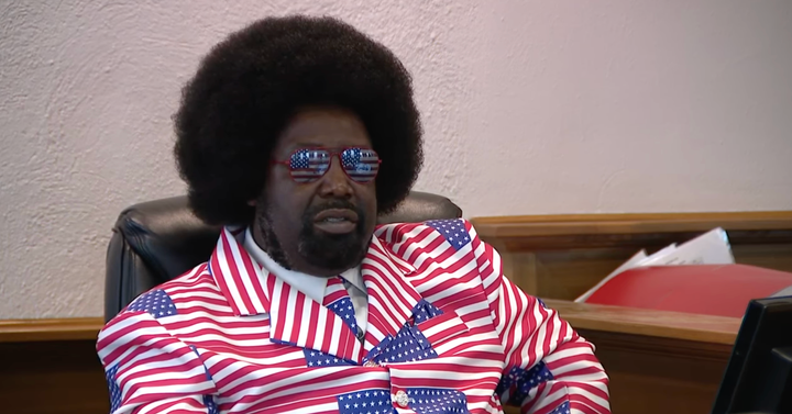 Afroman dressed up in a red, white, and blue flag suit