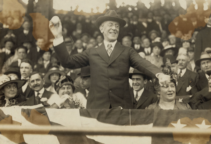 President Woodrow Wilson throwing out a first pitch