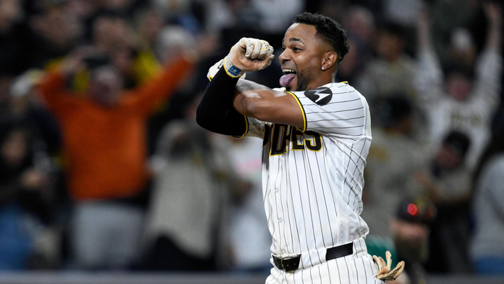Xander Bogaerts, his arm crossed in an "X"