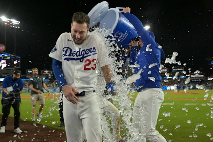 Kyle Tucker getting a Gatorade bath after the Dodgers win
