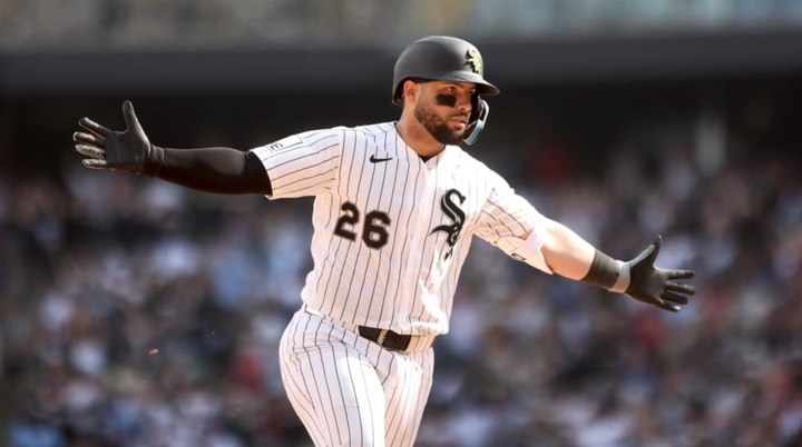 Edgar Quero with his arms out as he rounds the bases