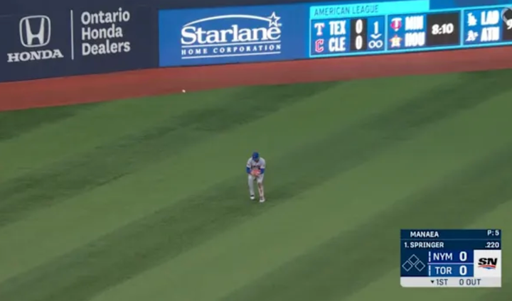 Juan Soto in the outfield 50 feet in front of a ball he missed
