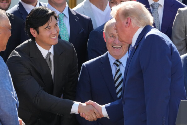 Shohei Ohtani shaking Donald Trump's hand