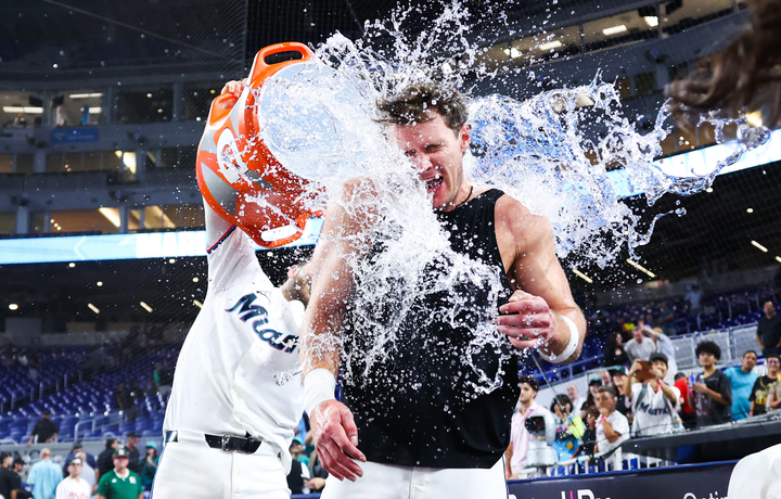 Griffin Conine gets a gatorade shower