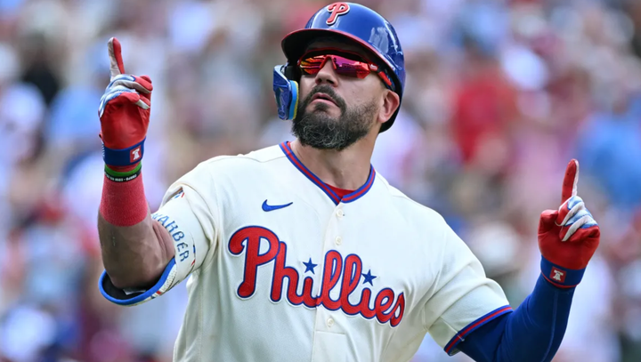 Derek Hill of the Phillies pointing up after a walkoff hit