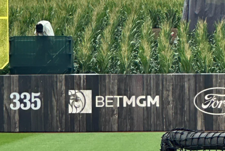 A BetMGM ad on the wall of the Field of Dreams field