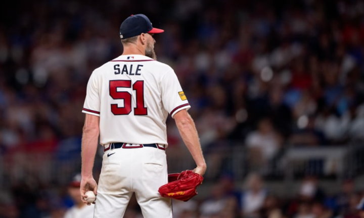 Chris Sale pitching, back to camera
