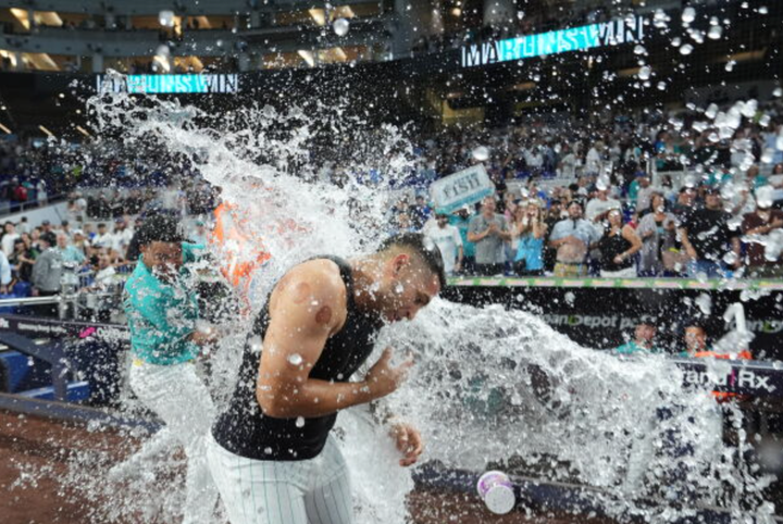 Augustín Ramírez getting a gatorade bath after homering to win it